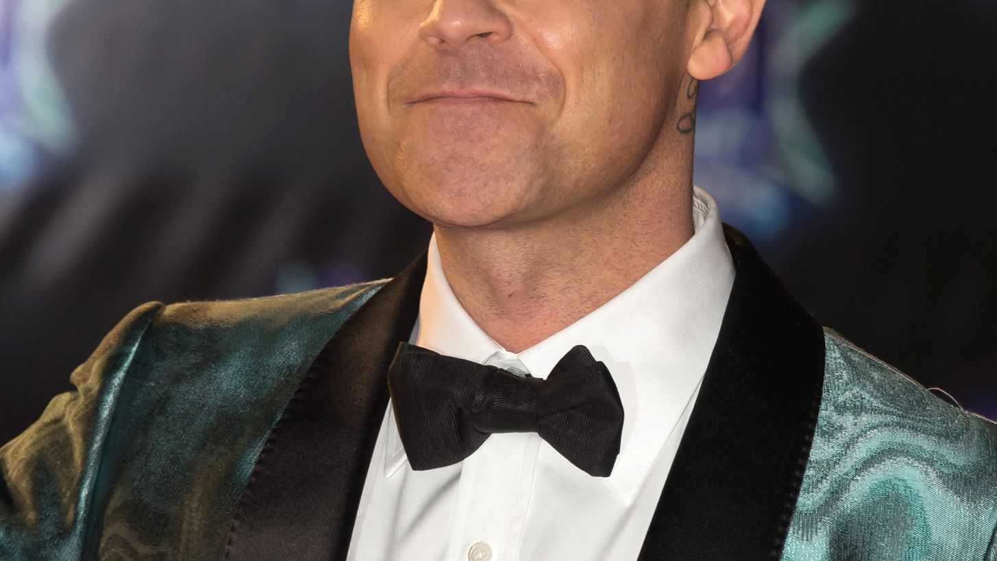 Robbie Williams | &#x397; &#x3B1;&#x3C0;&#x3BF;&#x3BA;&#x3AC;&#x3BB;&#x3C5;&#x3C8;&#x3B7; &#x3B3;&#x3B9;&#x3B1; &#x3C4;&#x3BF; &#x3C3;&#x3C5;&#x3BC;&#x3B2;&#x3CC;&#x3BB;&#x3B1;&#x3B9;&#x3BF; &#x3B8;&#x3B1;&#x3BD;&#x3AC;&#x3C4;&#x3BF;&#x3C5; &#x3C0;&#x3BF;&#x3C5; &#x3C5;&#x3C0;&#x3AE;&#x3C1;&#x3C7;&#x3B5; &#x3B3;&#x3B9;&#x3B1; &#x3B5;&#x3BA;&#x3B5;&#x3AF;&#x3BD;&#x3BF;&#x3BD; - &#x3A0;&#x3CE;&#x3C2; &#x3BA;&#x3B1;&#x3C4;&#x3AC;&#x3C6;&#x3B5;&#x3C1;&#x3B5; &#x3BD;&#x3B1; &#x3C3;&#x3C9;&#x3B8;&#x3B5;&#x3AF;