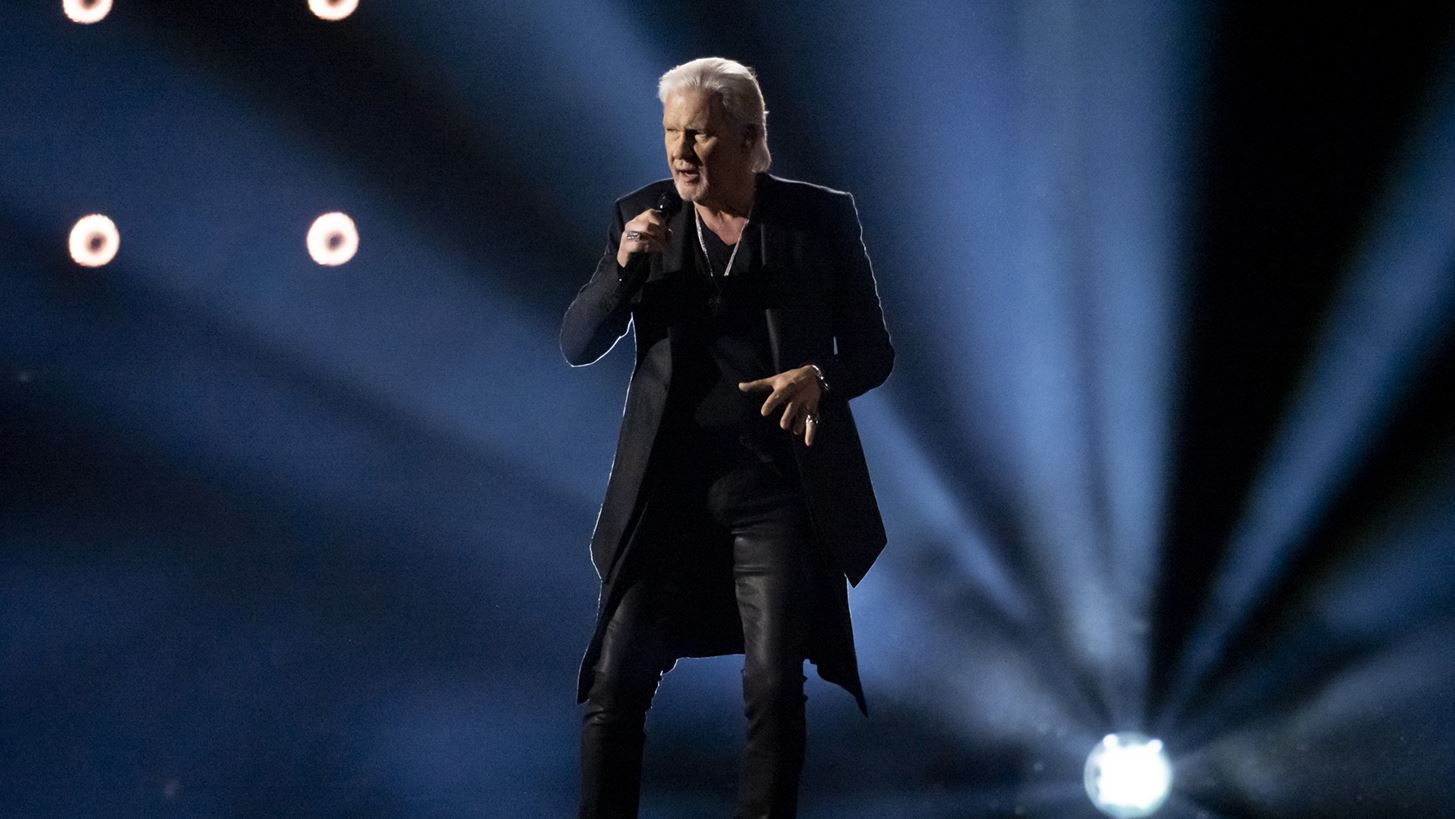 Johnny Logan | &#x397; &#x3B5;&#x3BE;&#x3BF;&#x3BC;&#x3BF;&#x3BB;&#x3CC;&#x3B3;&#x3B7;&#x3C3;&#x3B7; &#x3B3;&#x3B9;&#x3B1; &#x3C4;&#x3BF;&#x3BD; &#x3B8;&#x3AC;&#x3BD;&#x3B1;&#x3C4;&#x3BF; &#x3C4;&#x3C9;&#x3BD; &#x3B4;&#x3CD;&#x3BF; &#x3B1;&#x3B4;&#x3B5;&#x3C1;&#x3C6;&#x3CE;&#x3BD; &#x3C4;&#x3BF;&#x3C5; &#x3BA;&#x3B1;&#x3B9; &#x3C0;&#x3CE;&#x3C2; &#x3C4;&#x3BF;&#x3BD; &#x3B5;&#x3BD;&#x3AD;&#x3C0;&#x3BD;&#x3B5;&#x3C5;&#x3C3;&#x3B5; &#x3B7; &#x3C3;&#x3CD;&#x3B6;&#x3C5;&#x3B3;&#x3CC;&#x3C2; &#x3C4;&#x3BF;&#x3C5;